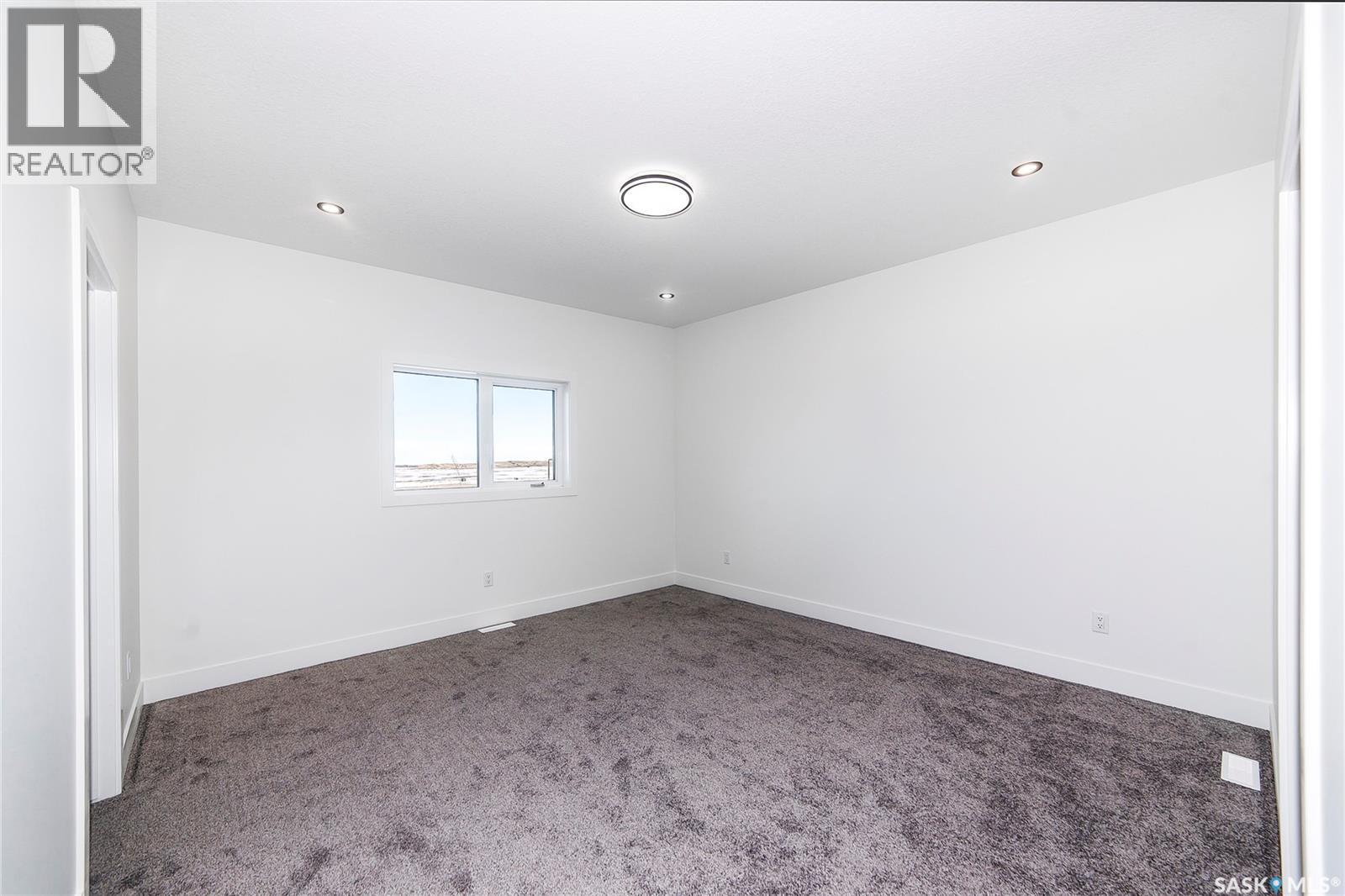 447 Woolf Bend, Saskatoon, SK - Indoor Photo Showing Other Room
