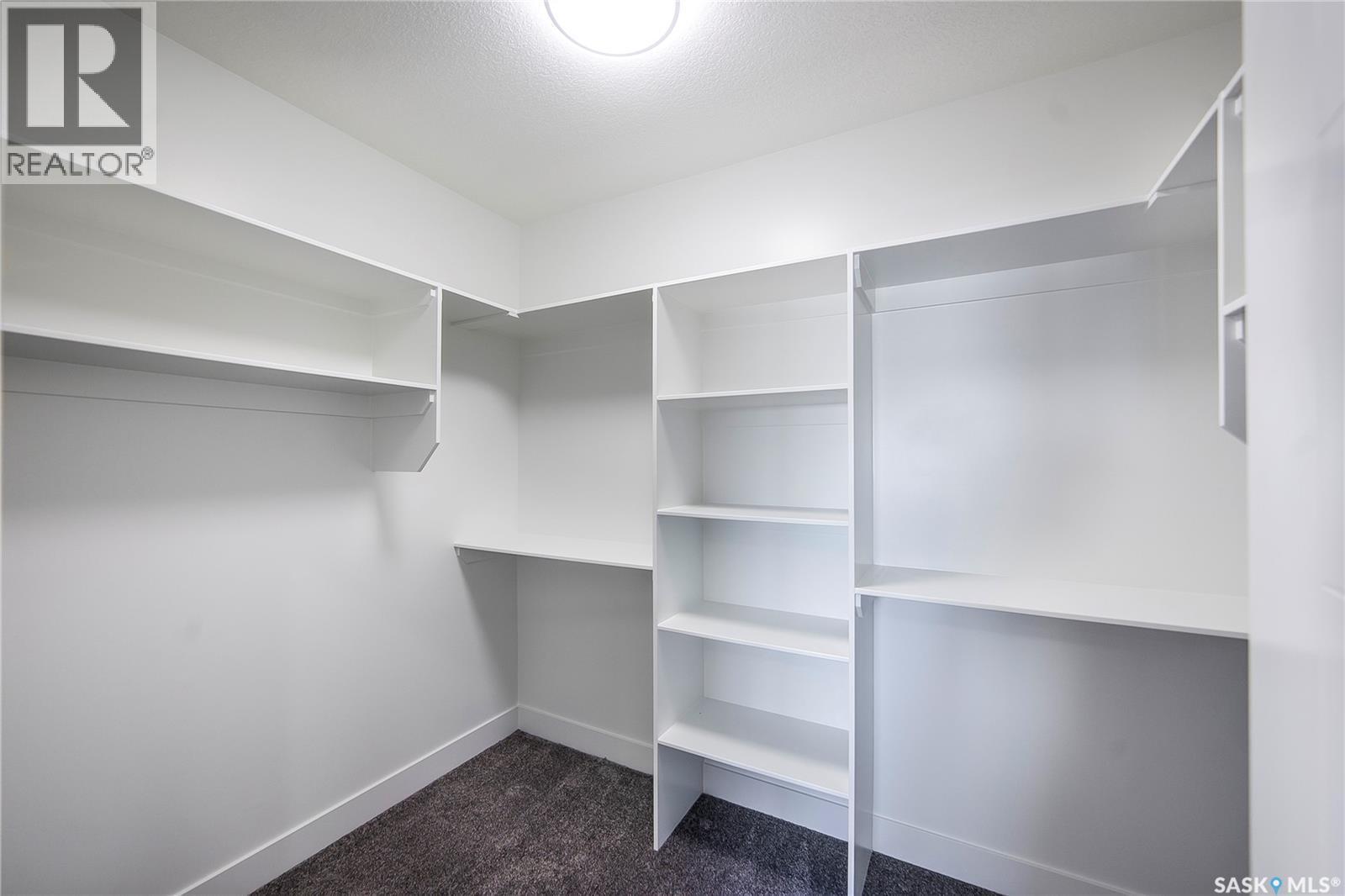 447 Woolf Bend, Saskatoon, SK - Indoor With Storage