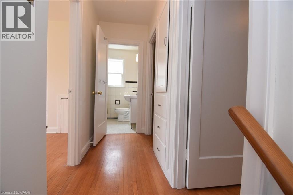 Hallway with light wood-type flooring - 136 Glen Road, Hamilton, ON - Indoor Photo Showing Other Room