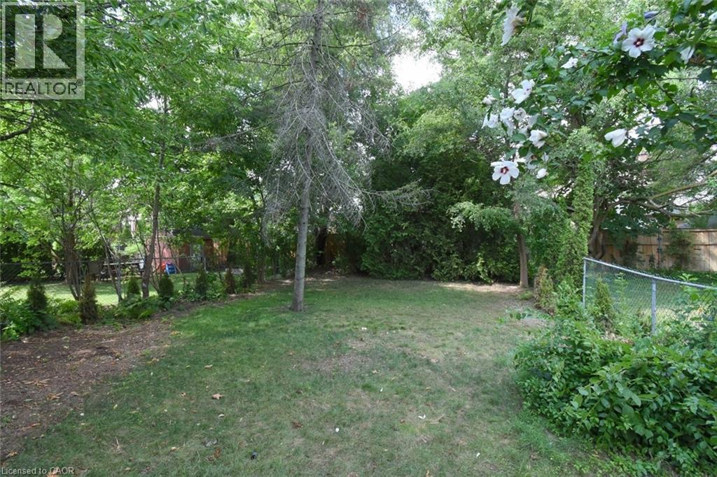View of fenced backyard - 136 Glen Road, Hamilton, ON - Outdoor