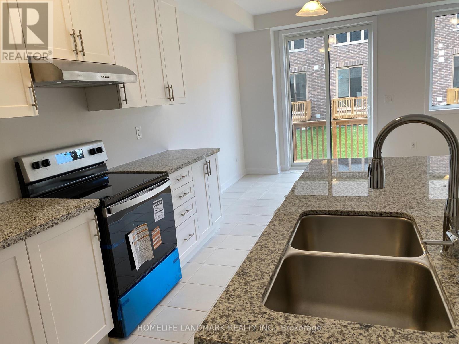 36 John Canning Way E, Markham, ON - Indoor Photo Showing Kitchen With Double Sink