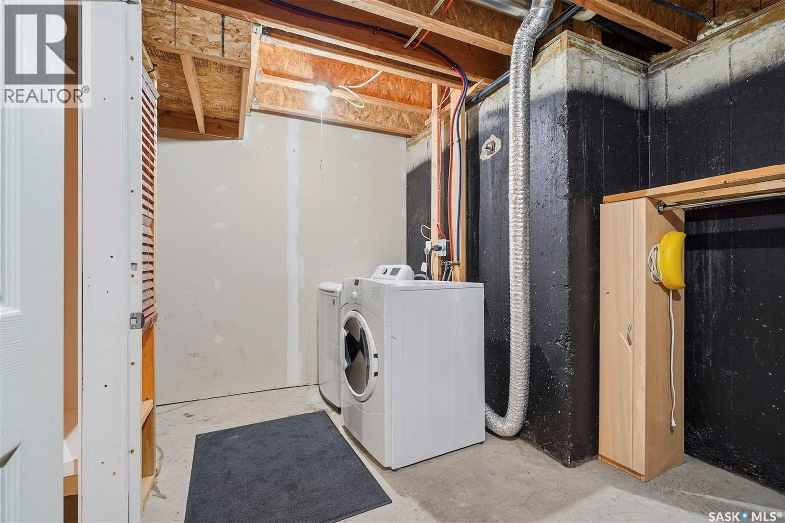 241 245 Ashworth Crescent, Saskatoon, SK - Indoor Photo Showing Laundry Room