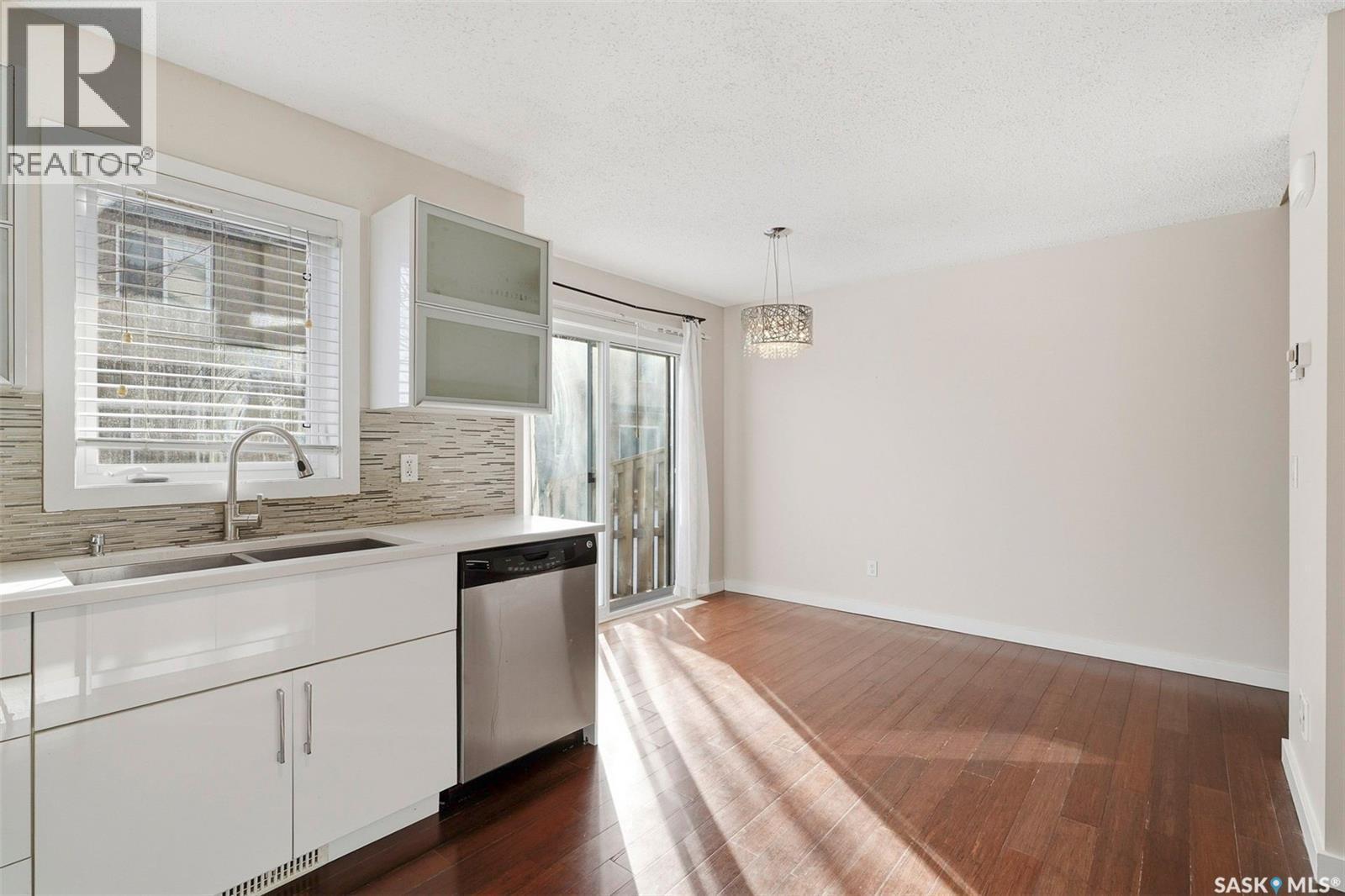 241 245 Ashworth Crescent, Saskatoon, SK - Indoor Photo Showing Kitchen With Double Sink