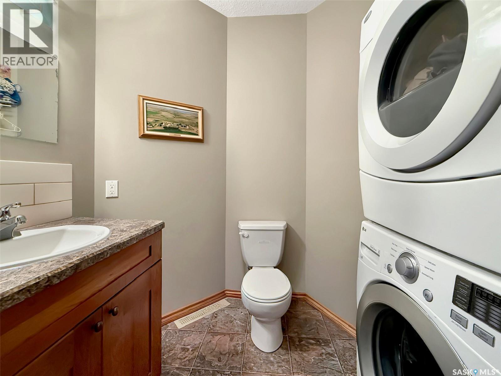 The Landing Acreage, Saskatchewan Landing, SK - Indoor Photo Showing Laundry Room