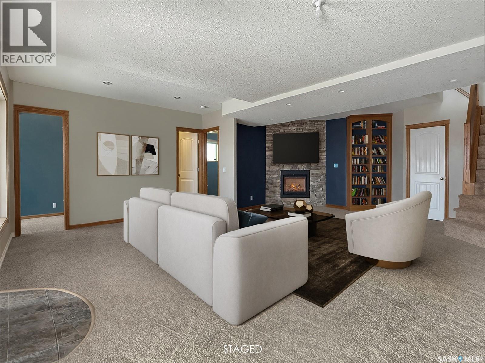 The Landing Acreage, Saskatchewan Landing, SK - Indoor Photo Showing Other Room With Fireplace