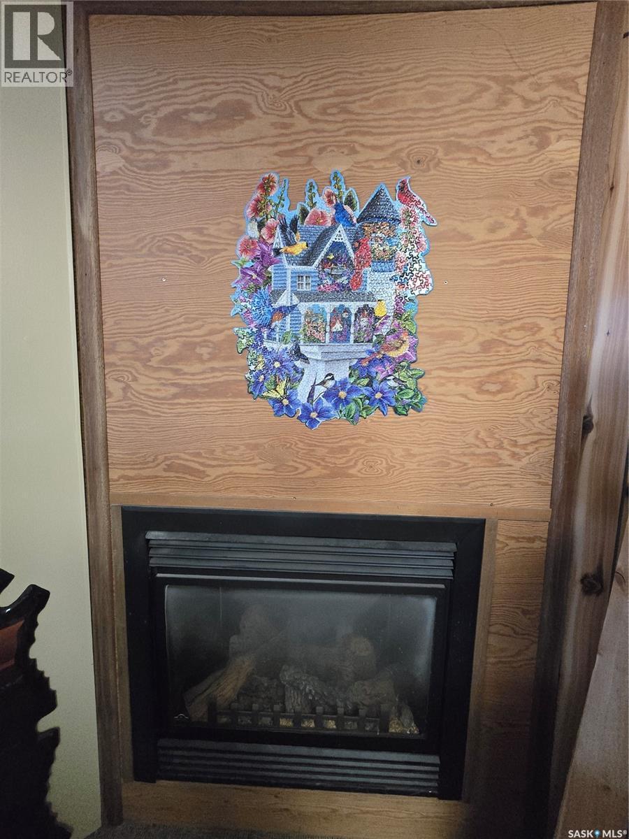 517 Nina Street, Broadview, SK - Indoor Photo Showing Living Room With Fireplace