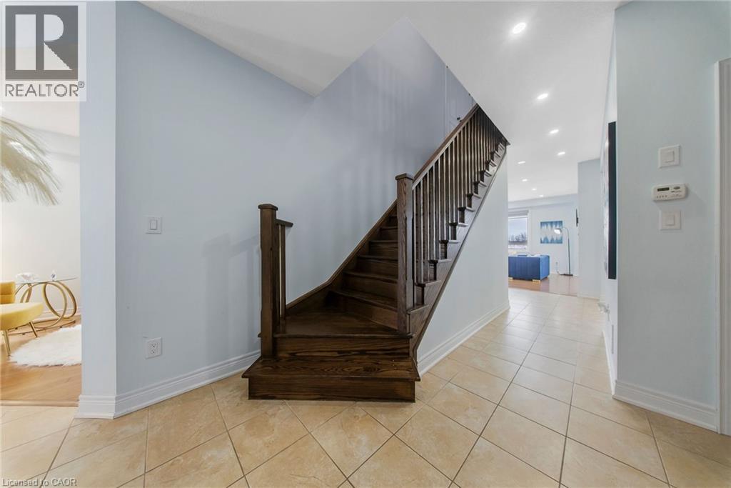 Stairway featuring tile patterned floors and recessed lighting - 59 Greti Drive, Hamilton, ON - Indoor Photo Showing Other Room