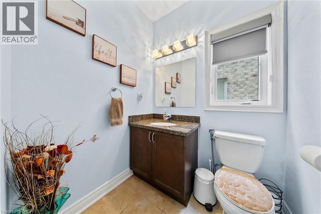 Bathroom with vanity and light tile patterned floors - 59 Greti Drive, Hamilton, ON - Indoor Photo Showing Bathroom