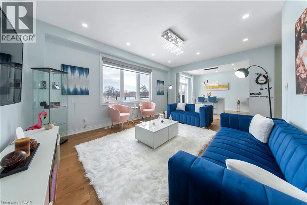Living room with wood finished floors and recessed lighting - 59 Greti Drive, Hamilton, ON - Indoor Photo Showing Living Room