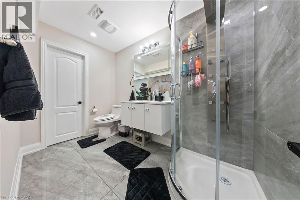 Bathroom with vanity and a stall shower - 59 Greti Drive, Hamilton, ON - Indoor Photo Showing Bathroom