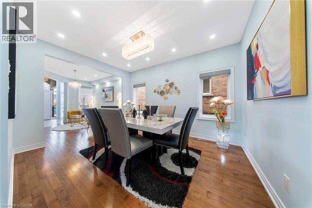 Dining area featuring hardwood / wood-style floors and recessed lighting - 59 Greti Drive, Hamilton, ON - Indoor Photo Showing Dining Room