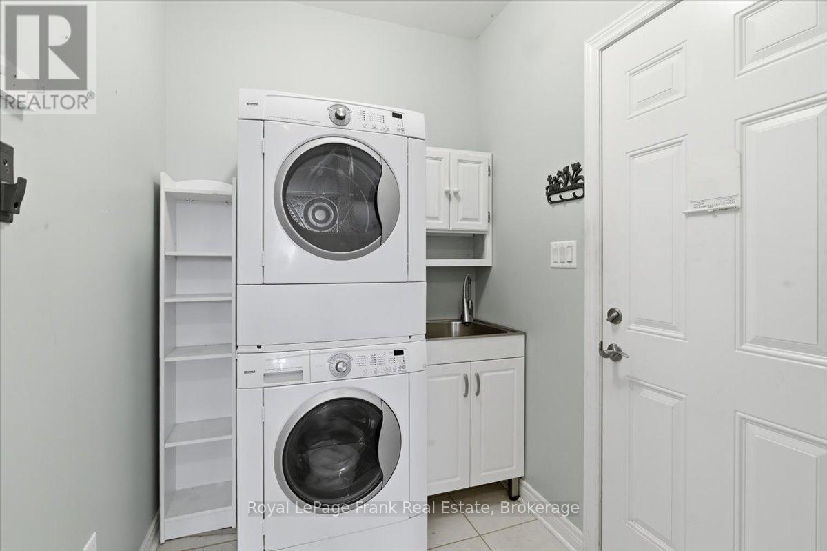 Laundry and Direct Access to Garage - 25 Apple Tree Crescent, Uxbridge, ON - Indoor Photo Showing Laundry Room