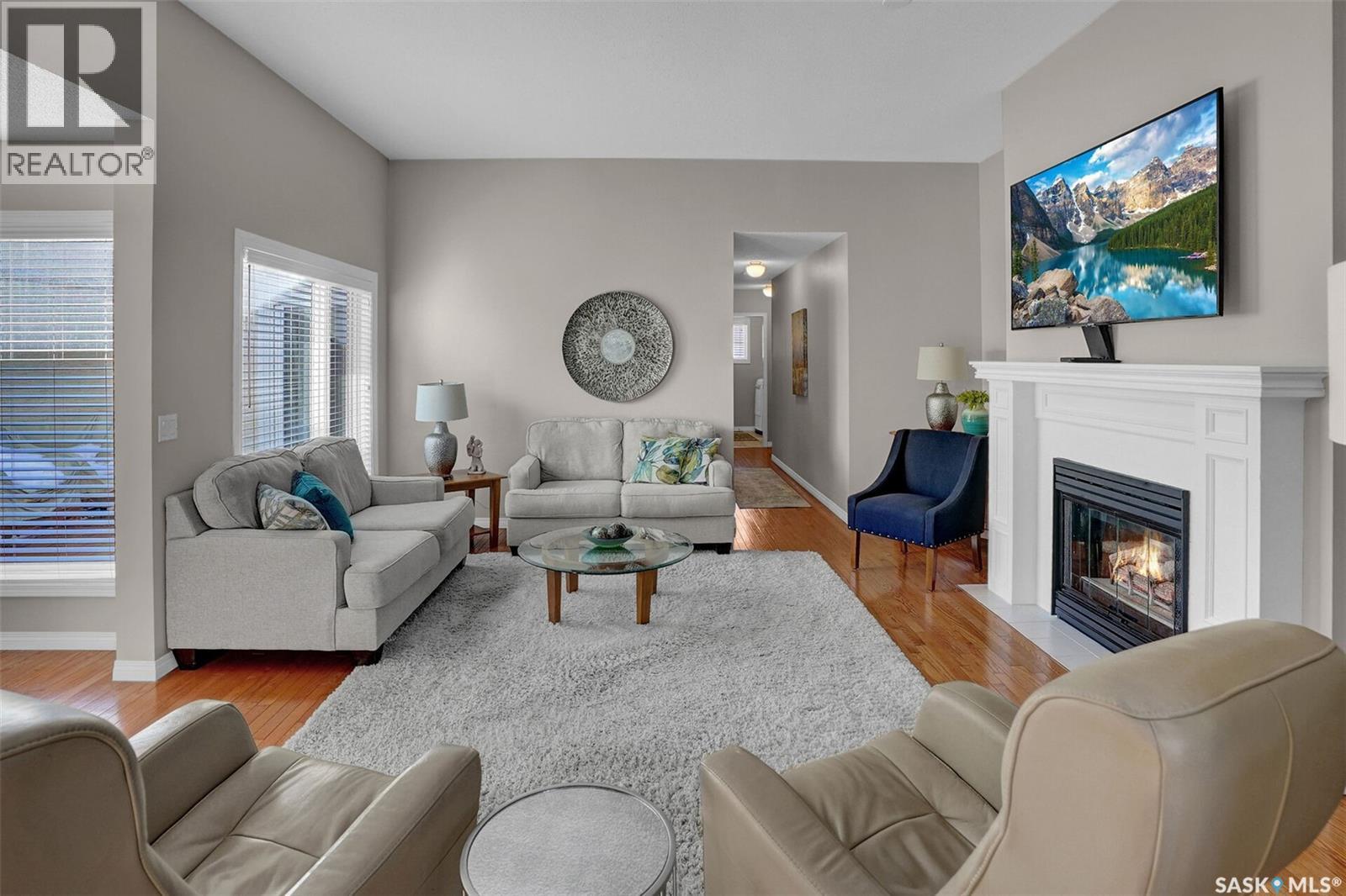 72 Kensington Crescent, Regina, SK - Indoor Photo Showing Living Room With Fireplace