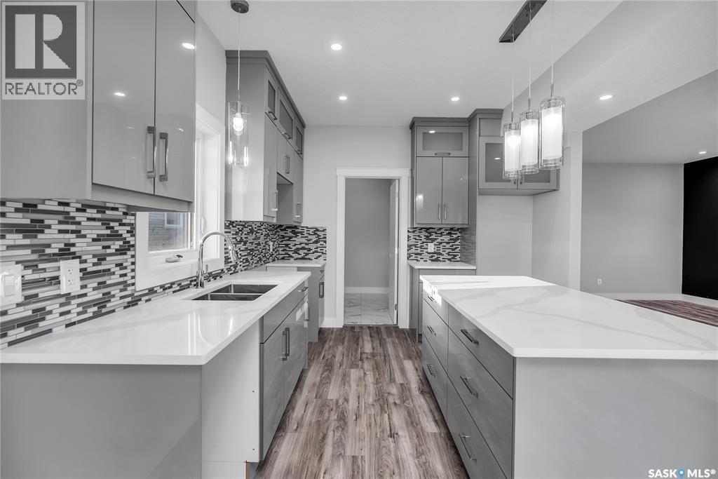 146 Sharma Lane, Saskatoon, SK - Indoor Photo Showing Kitchen With Double Sink With Upgraded Kitchen