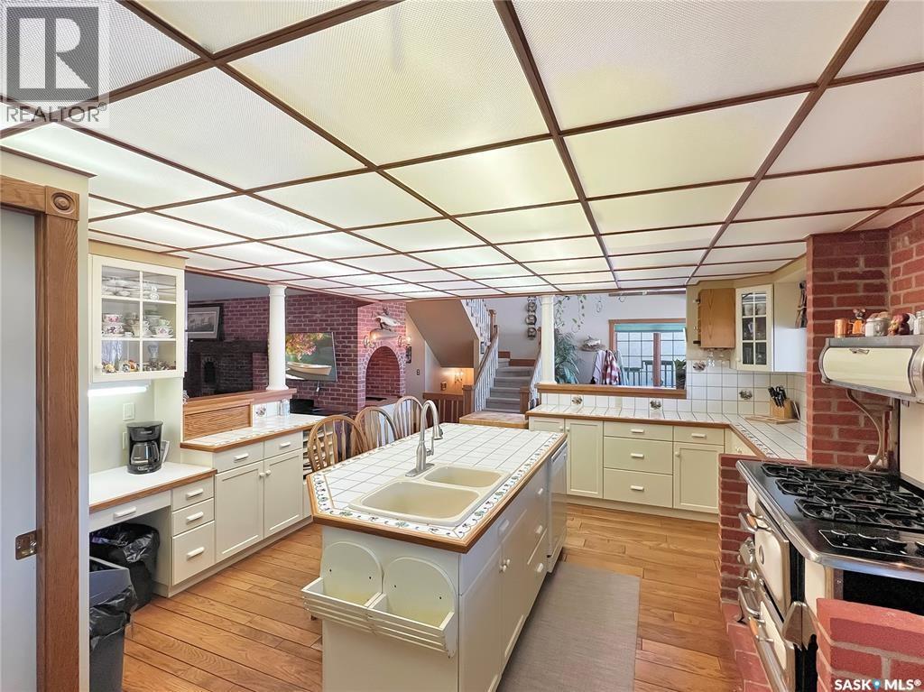 1219 River Street E, Prince Albert, SK - Indoor Photo Showing Kitchen With Double Sink