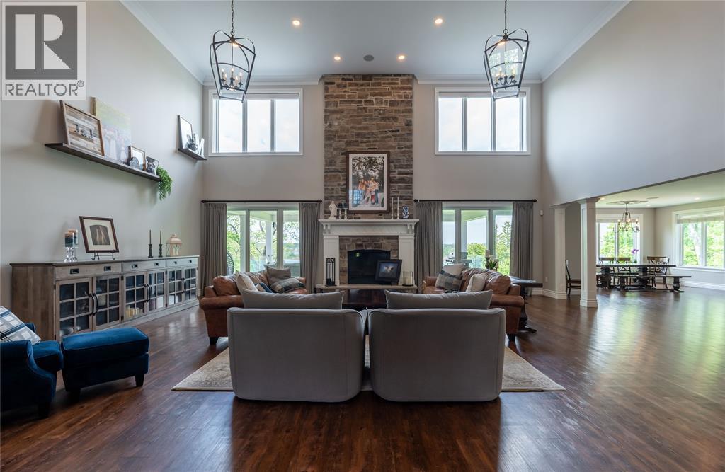 647 St Clair Parkway, St Clair, ON - Indoor Photo Showing Living Room With Fireplace
