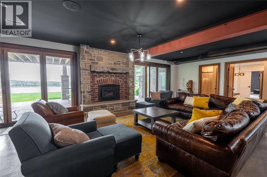647 St Clair Parkway, St Clair, ON - Indoor Photo Showing Living Room With Fireplace