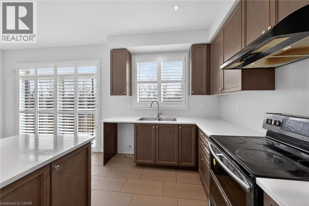 17 Larry Crescent, Caledonia, ON - Indoor Photo Showing Kitchen With Double Sink