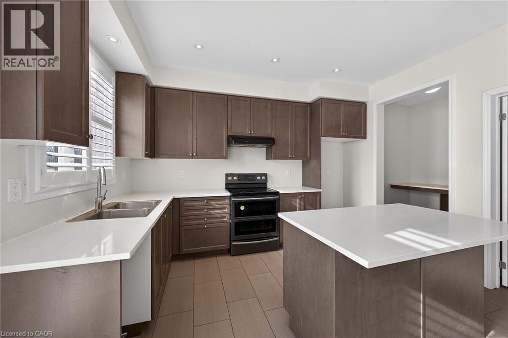 17 Larry Crescent, Caledonia, ON - Indoor Photo Showing Kitchen With Double Sink