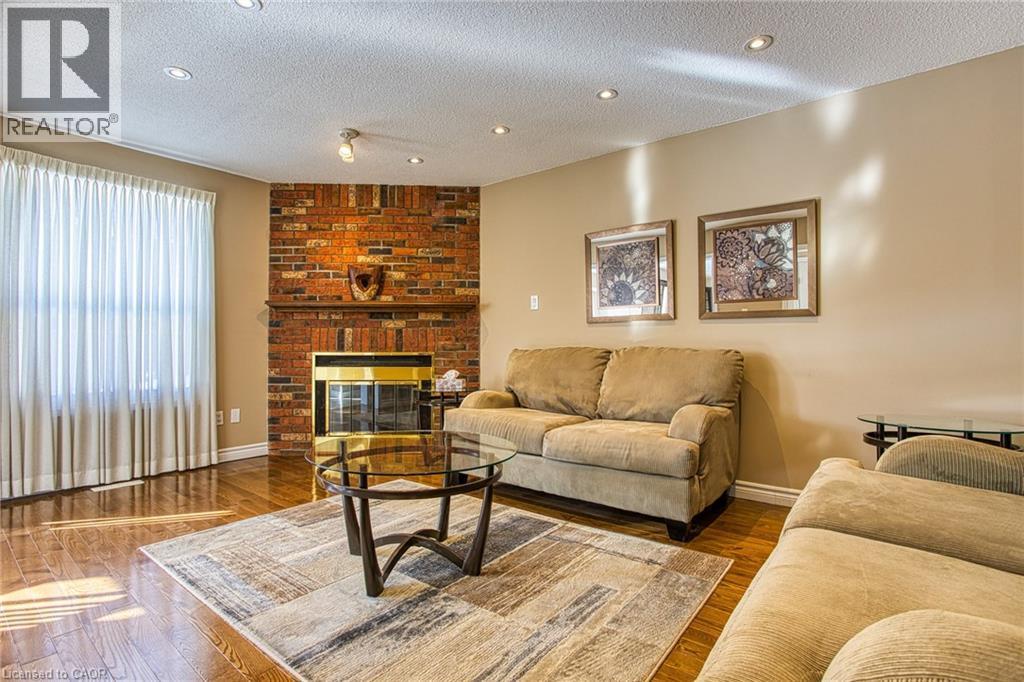211 Rushdale Drive, Hamilton, ON - Indoor Photo Showing Living Room With Fireplace