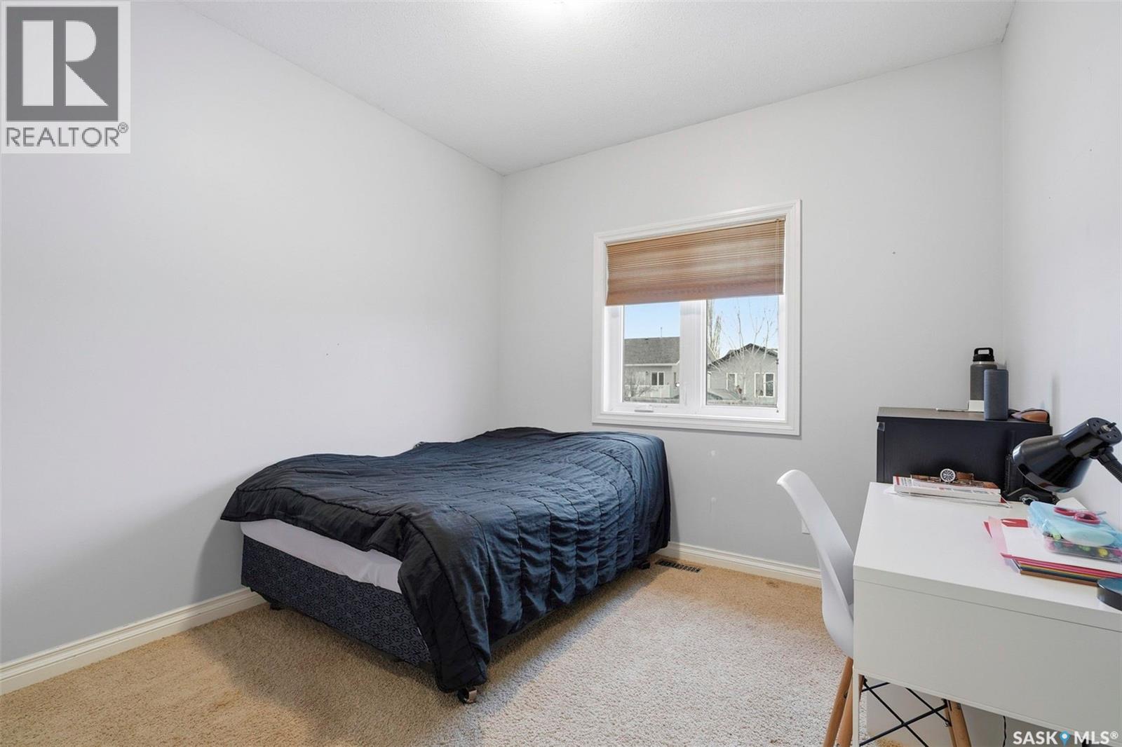 810 Rock Hill Lane, Martensville, SK - Indoor Photo Showing Bedroom
