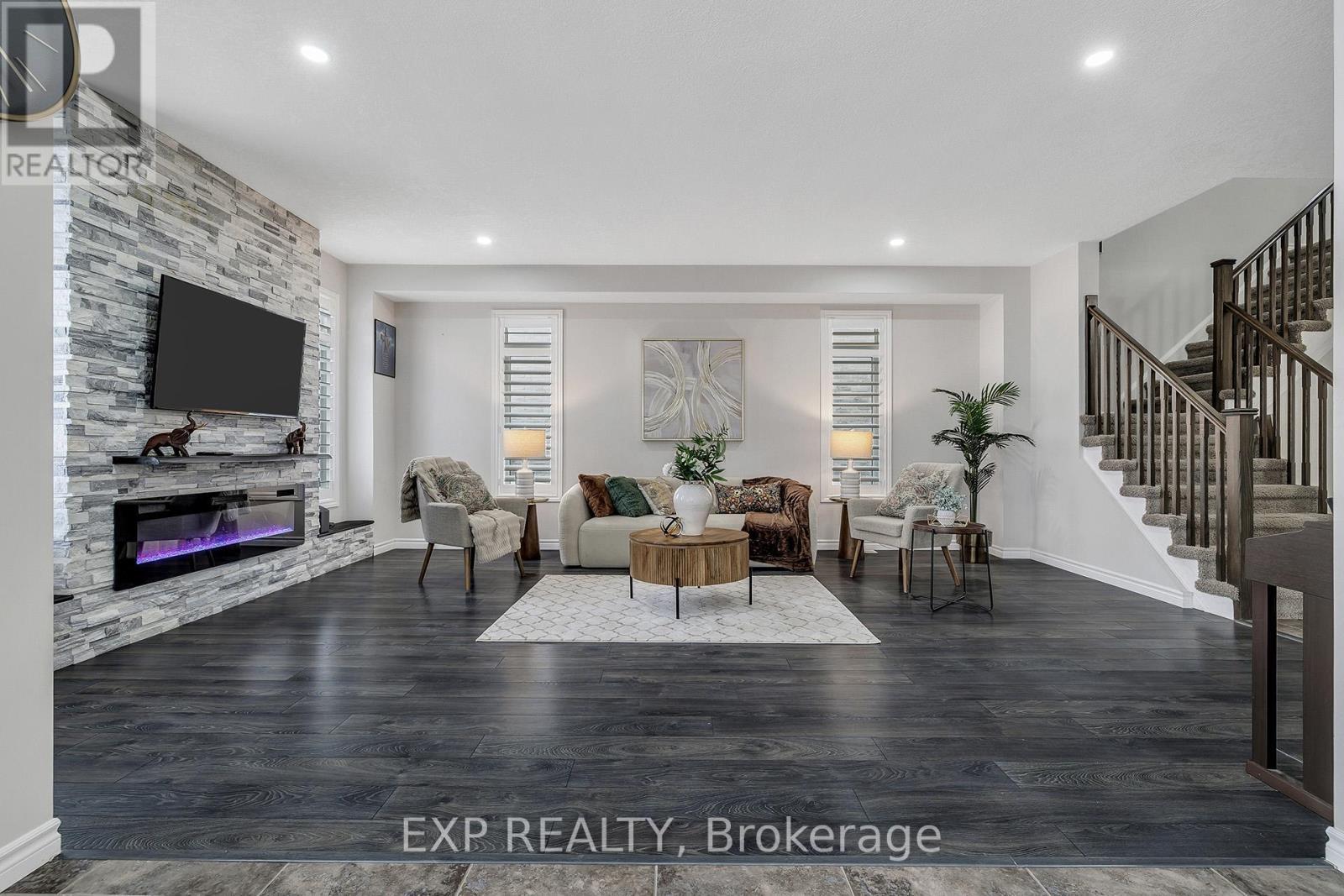 297 Thomas Slee Drive, Kitchener, ON - Indoor Photo Showing Living Room With Fireplace