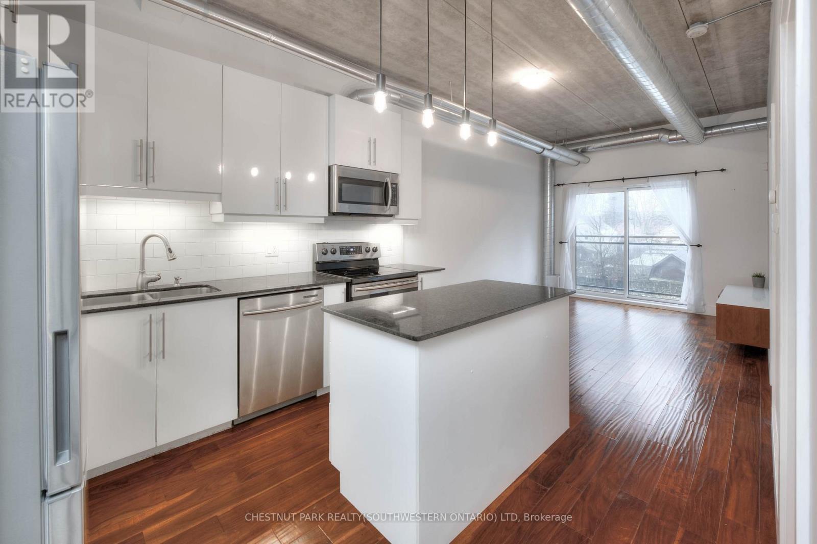 103 - 15 Devitt Avenue S, Waterloo, ON - Indoor Photo Showing Kitchen With Double Sink With Upgraded Kitchen