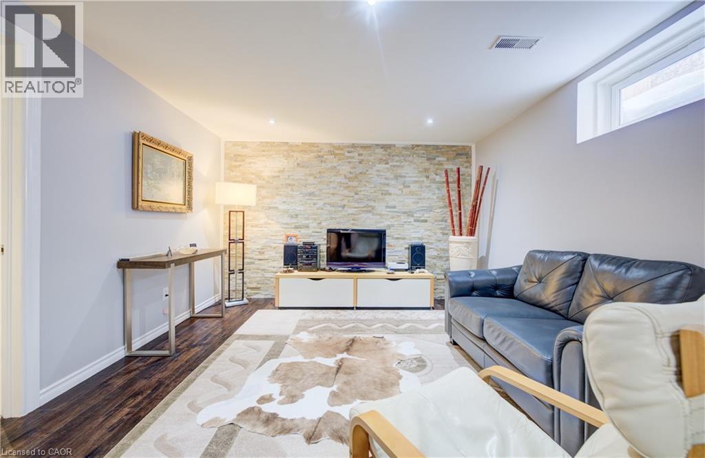 64 Hidden Creek Drive, Kitchener, ON - Indoor Photo Showing Living Room With Fireplace