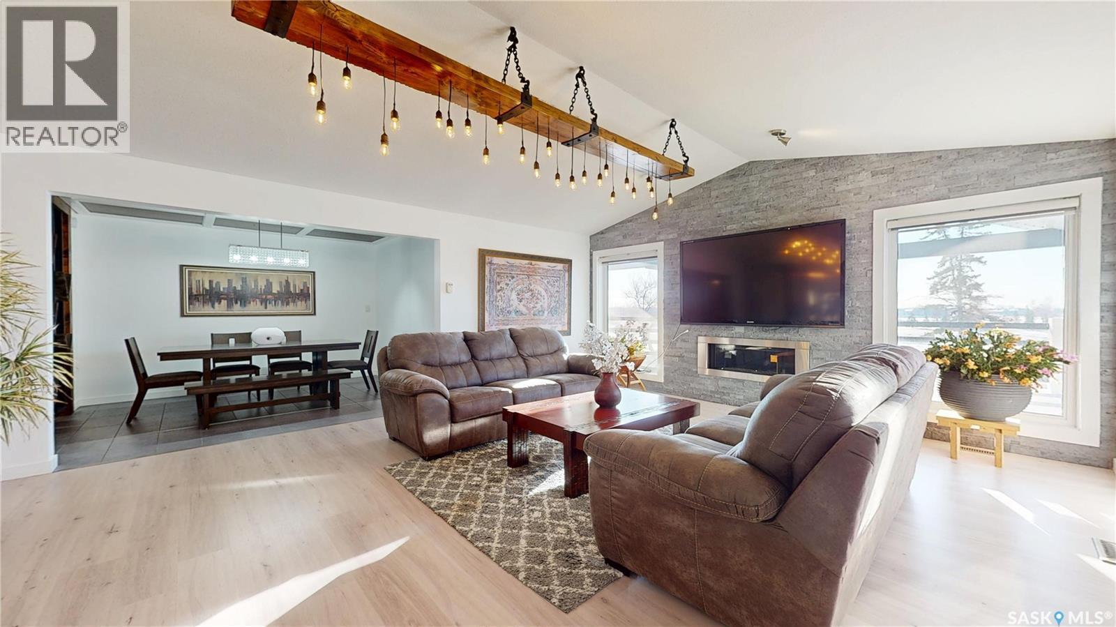 8507 Kestral Drive, Regina, SK - Indoor Photo Showing Living Room With Fireplace