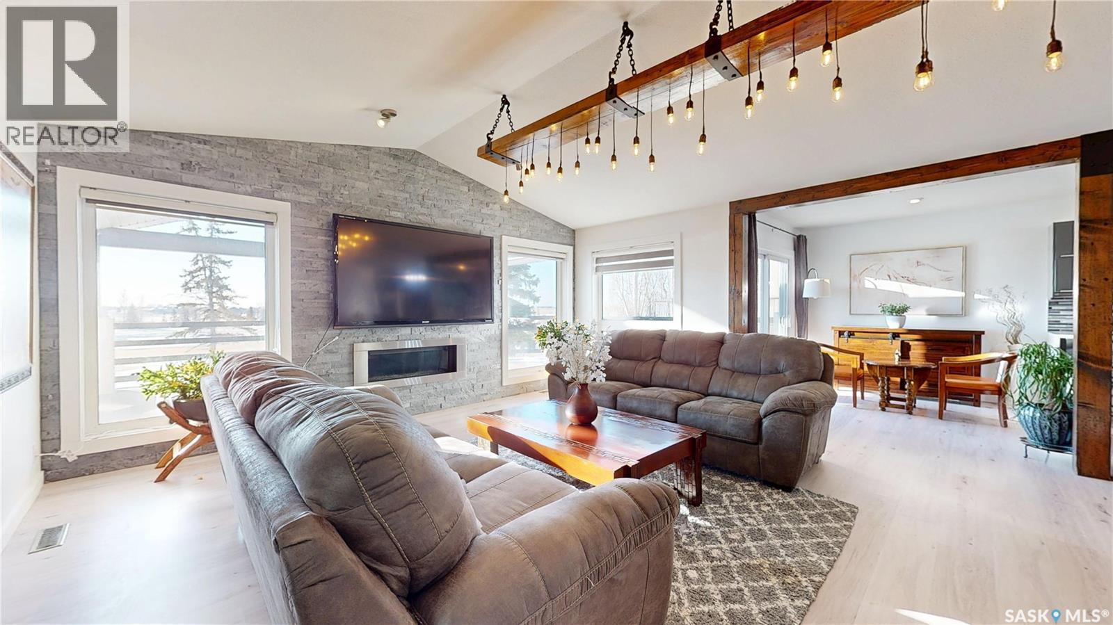 8507 Kestral Drive, Regina, SK - Indoor Photo Showing Living Room With Fireplace