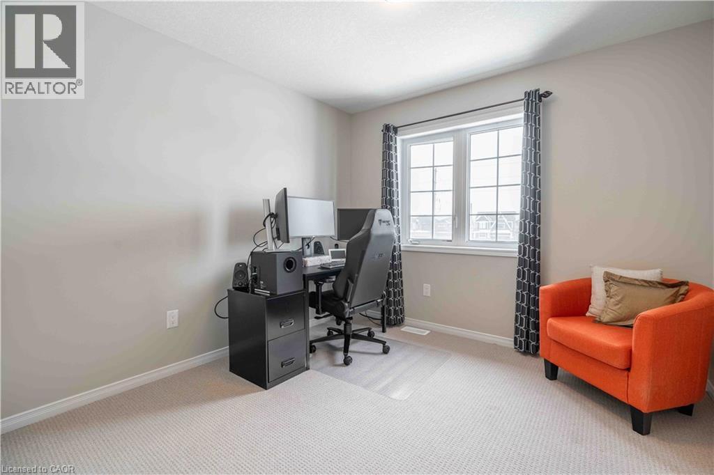 4th Bedroom presently used as a home office, lounge area. - 115 Larry Crescent, Caledonia, ON - Indoor Photo Showing Office