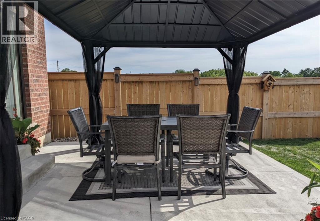 Daytime view of patio, gazebo - a private, refreshing place to relax and enjoy! - 115 Larry Crescent, Caledonia, ON - Outdoor With Deck Patio Veranda