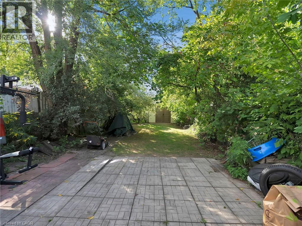 View of patio / terrace with a storage shed - 210 East 24Th Street, Hamilton, ON - Outdoor