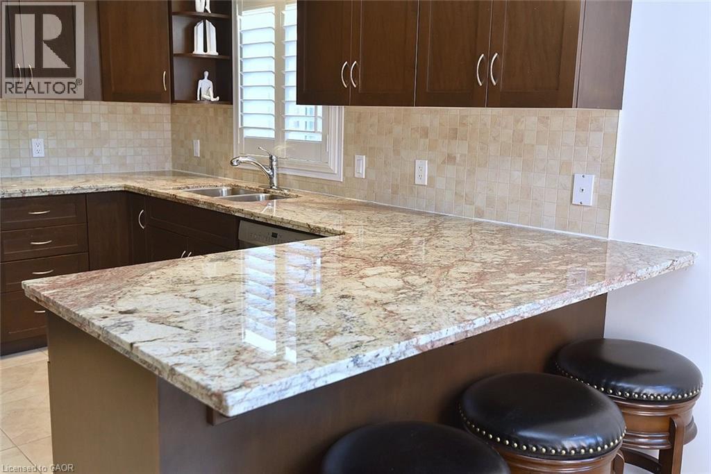 12 Degrow Crescent, Binbrook, ON - Indoor Photo Showing Kitchen With Double Sink With Upgraded Kitchen