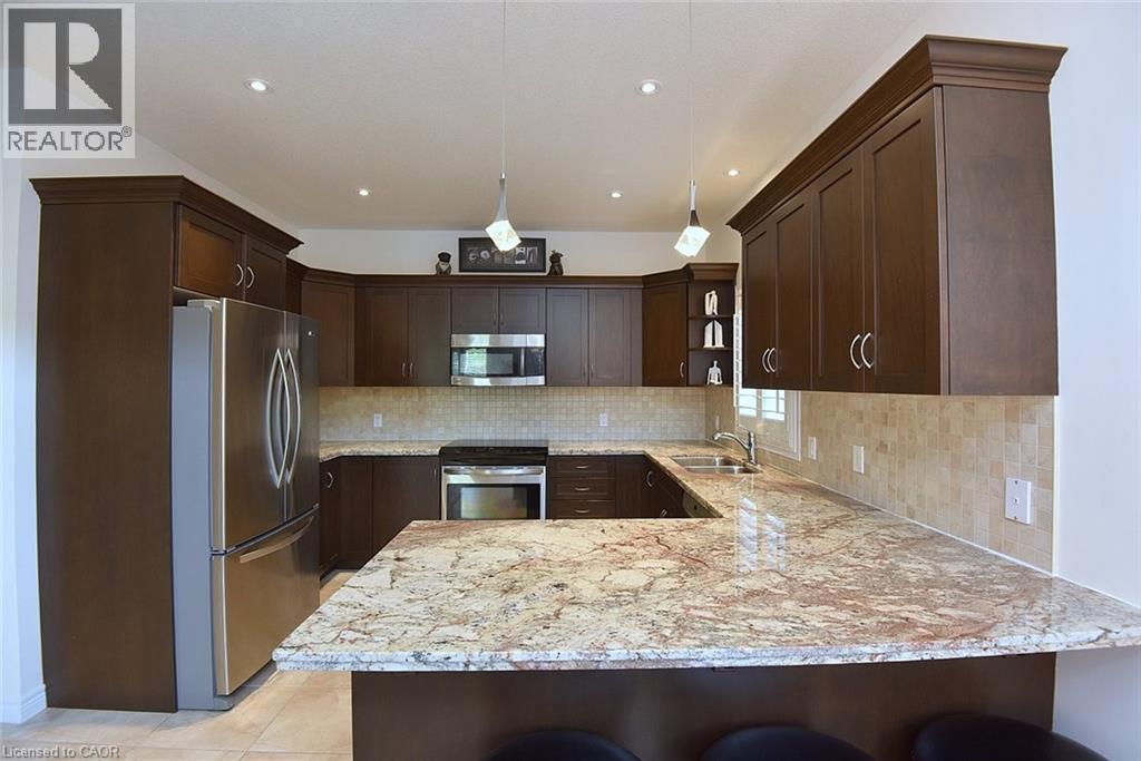 12 Degrow Crescent, Binbrook, ON - Indoor Photo Showing Kitchen With Stainless Steel Kitchen With Double Sink With Upgraded Kitchen