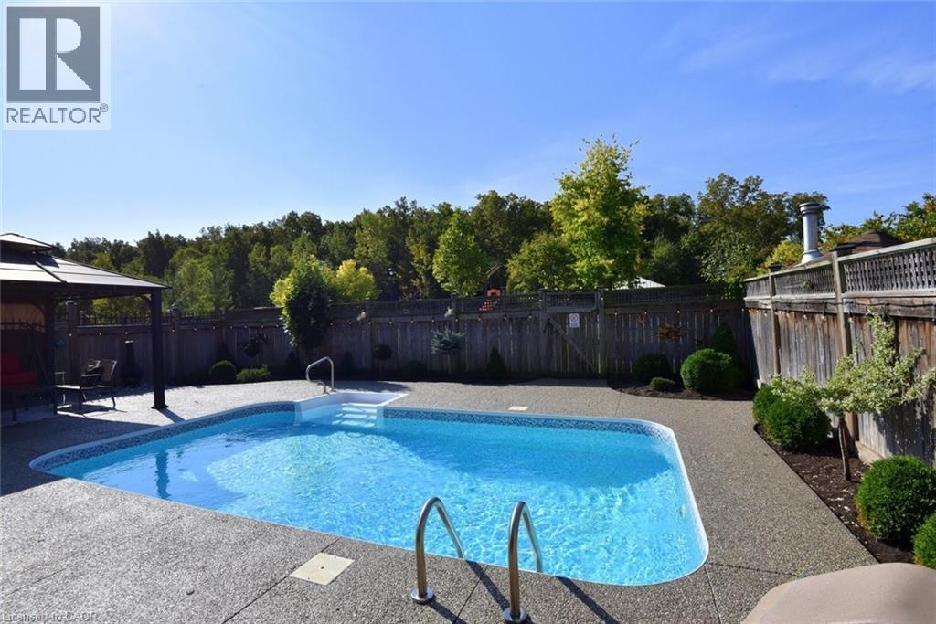 12 Degrow Crescent, Binbrook, ON - Outdoor With In Ground Pool With Backyard