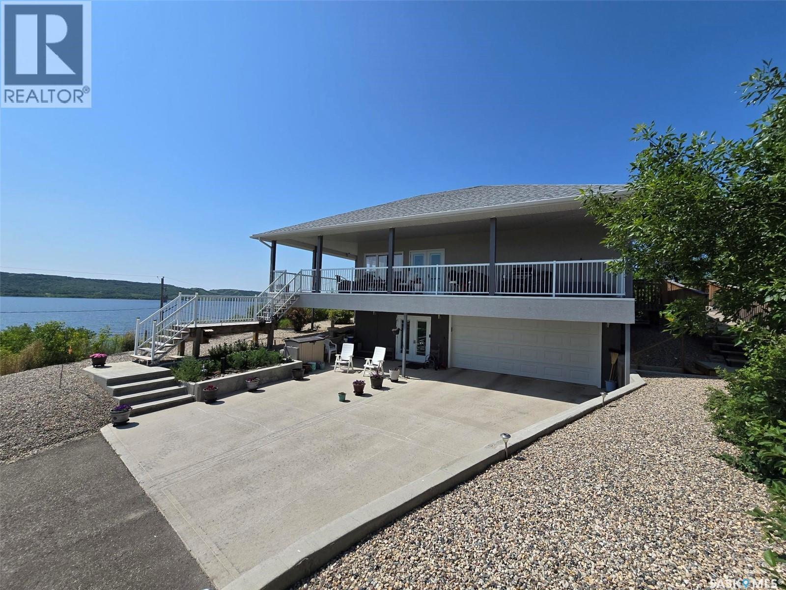 207 Criddle Avenue, Crooked Lake Provincial Park, SK - Outdoor With Body Of Water With Deck Patio Veranda