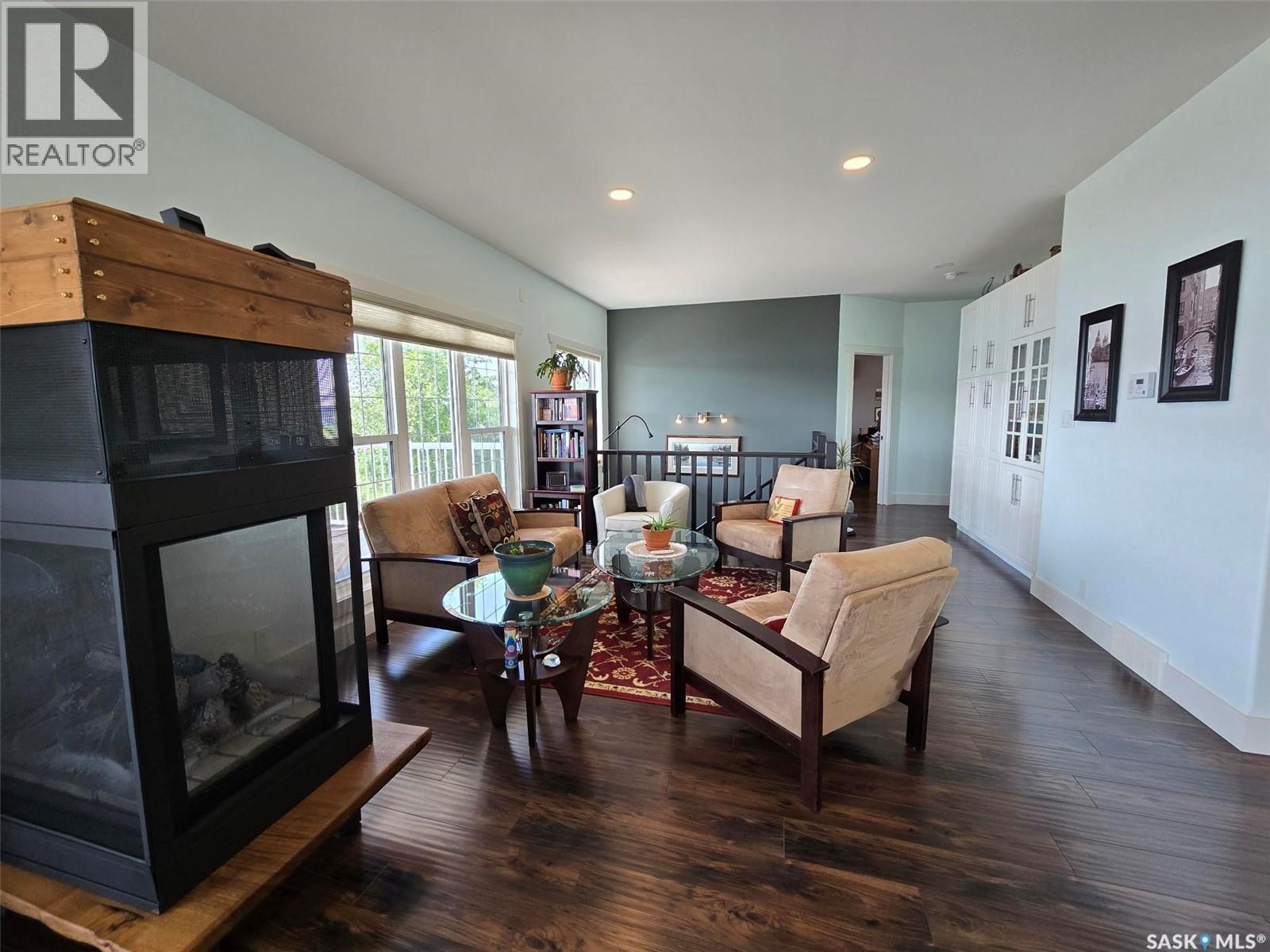 207 Criddle Avenue, Crooked Lake, SK - Indoor Photo Showing Living Room With Fireplace