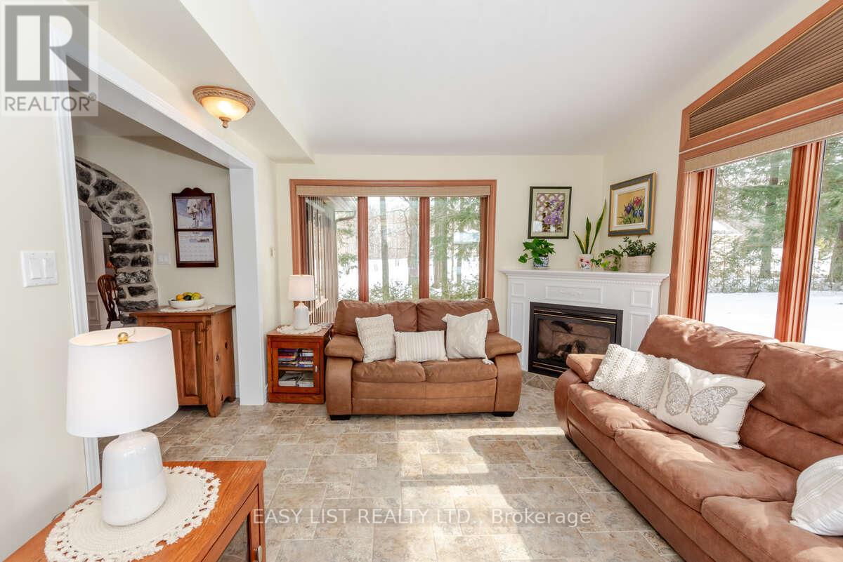 704 Pattee Road, Champlain, ON - Indoor Photo Showing Living Room With Fireplace