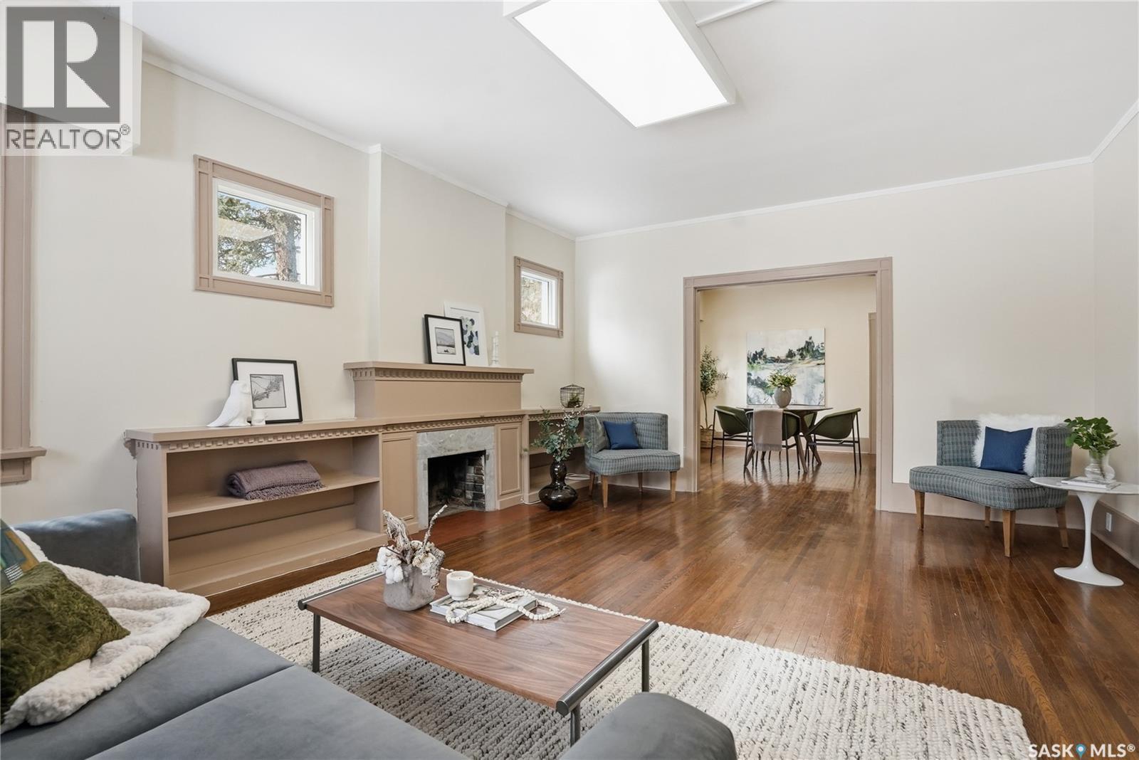 1213 Elliott Street, Saskatoon, SK - Indoor Photo Showing Living Room With Fireplace