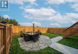 Backyard has been virtually staged. -