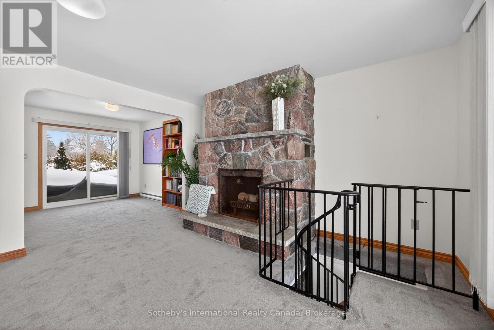 Dining space beside the fireplace - 1420 Tiny Beaches Road N, Tiny, ON - Indoor With Fireplace