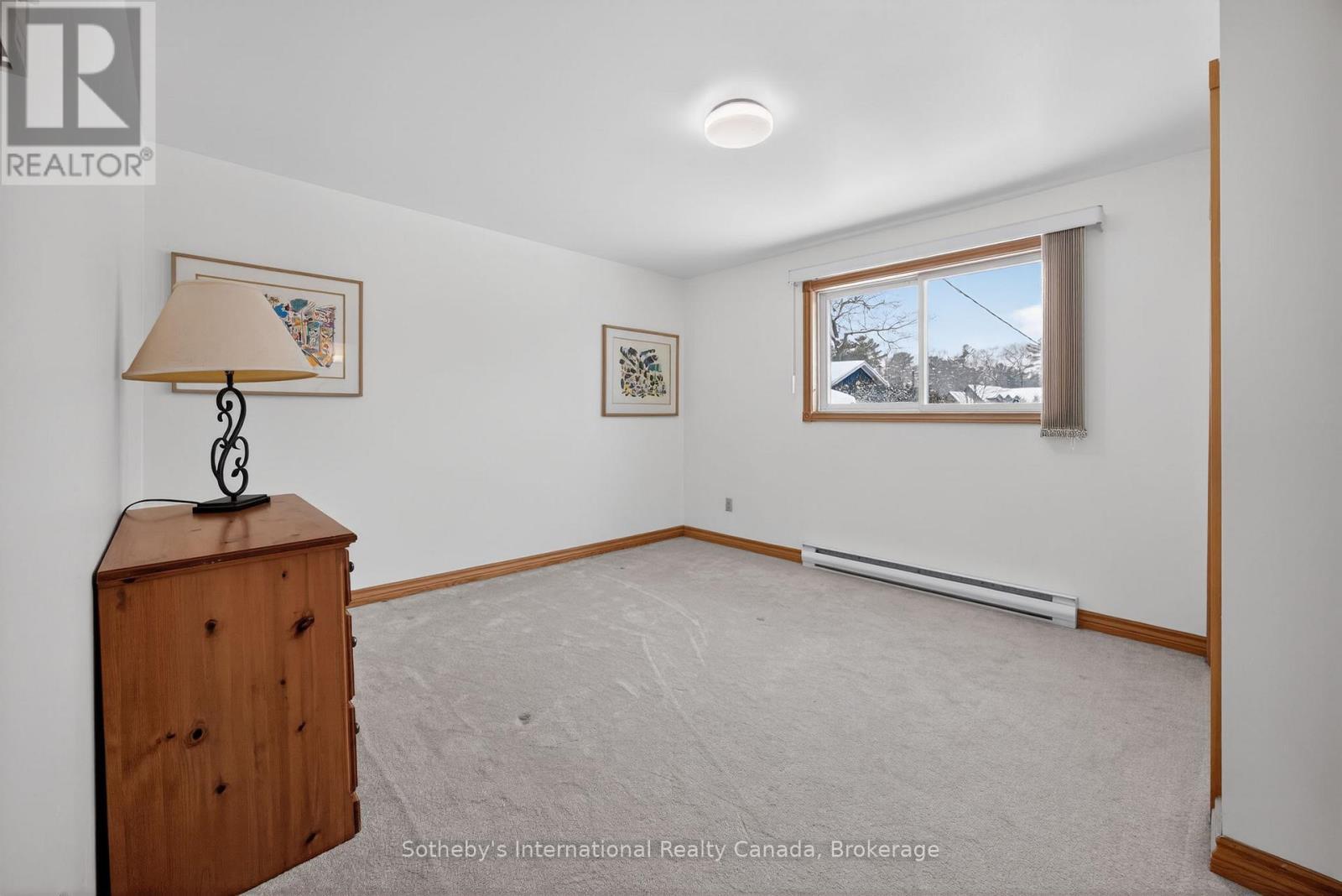 Main level Primary bedroom - 1420 Tiny Beaches Road N, Tiny, ON - Indoor Photo Showing Other Room