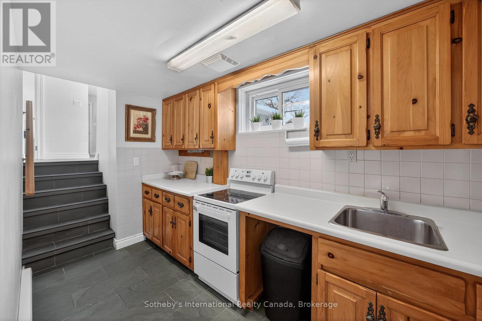 Lower level galley kitchen - 1420 Tiny Beaches Road N, Tiny, ON - Indoor Photo Showing Kitchen
