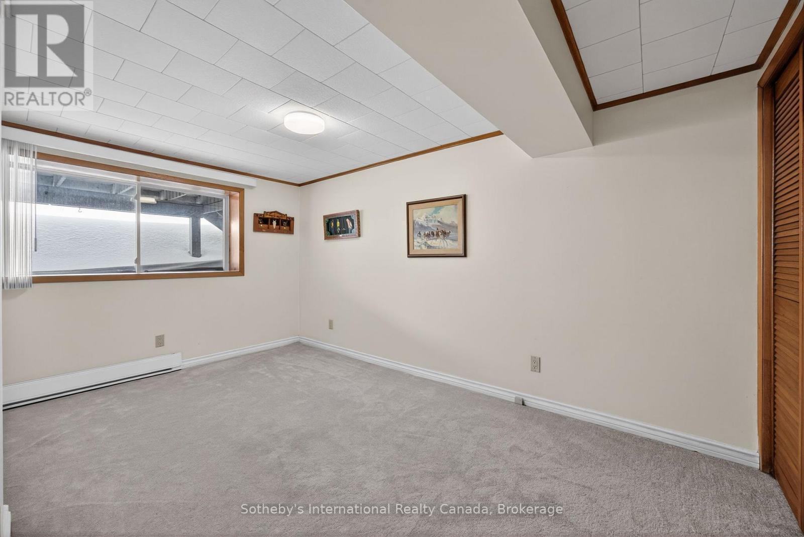Lower level bedroom 1 - 1420 Tiny Beaches Road N, Tiny, ON - Indoor Photo Showing Other Room