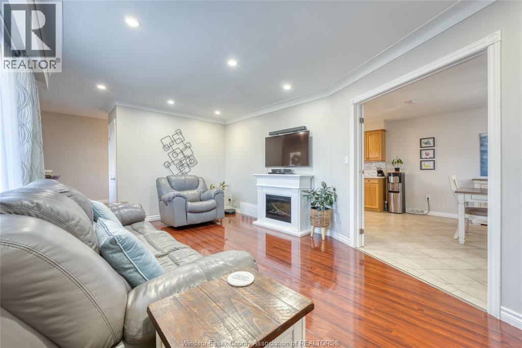 111 Danforth, Leamington, ON - Indoor Photo Showing Living Room With Fireplace