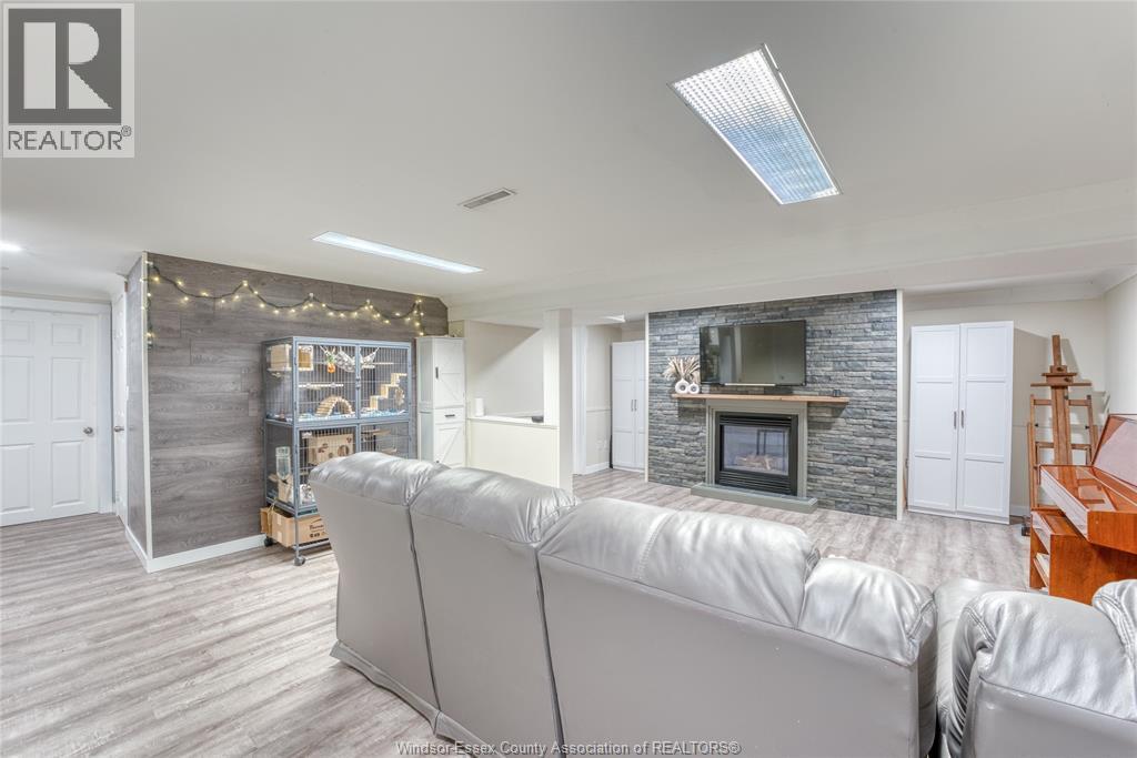111 Danforth, Leamington, ON - Indoor Photo Showing Living Room With Fireplace