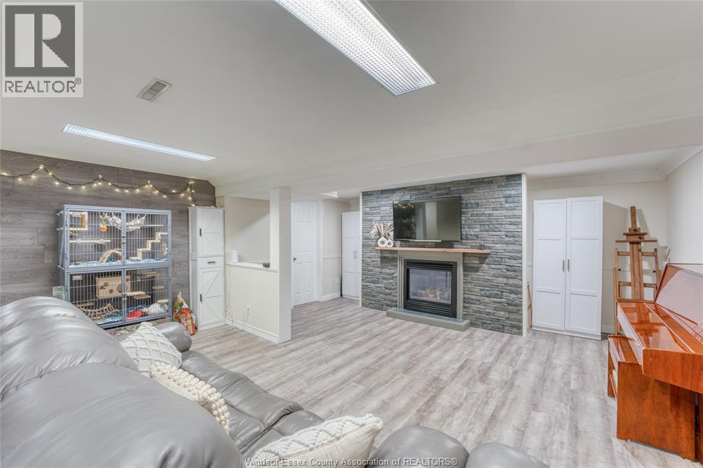 111 Danforth, Leamington, ON - Indoor Photo Showing Living Room With Fireplace