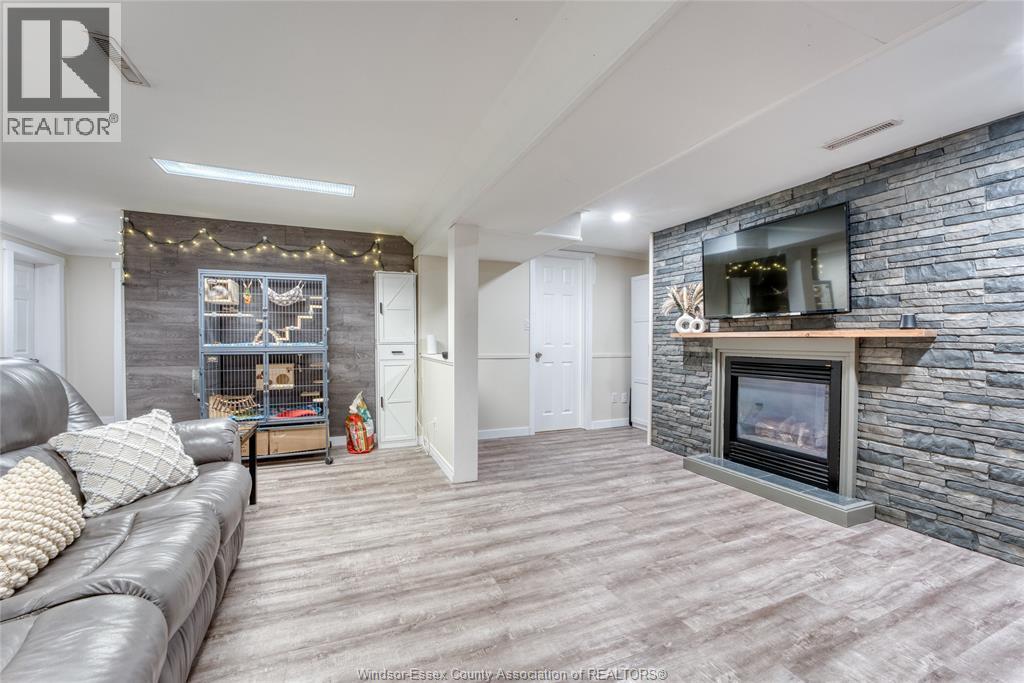 111 Danforth, Leamington, ON - Indoor Photo Showing Other Room With Fireplace