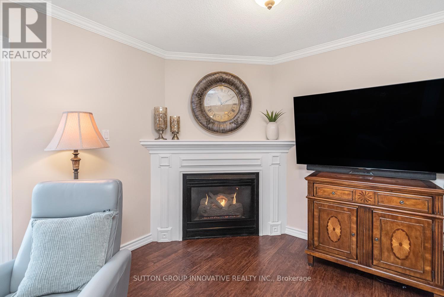 27 Beaverton Drive, Hamilton, ON - Indoor Photo Showing Living Room With Fireplace